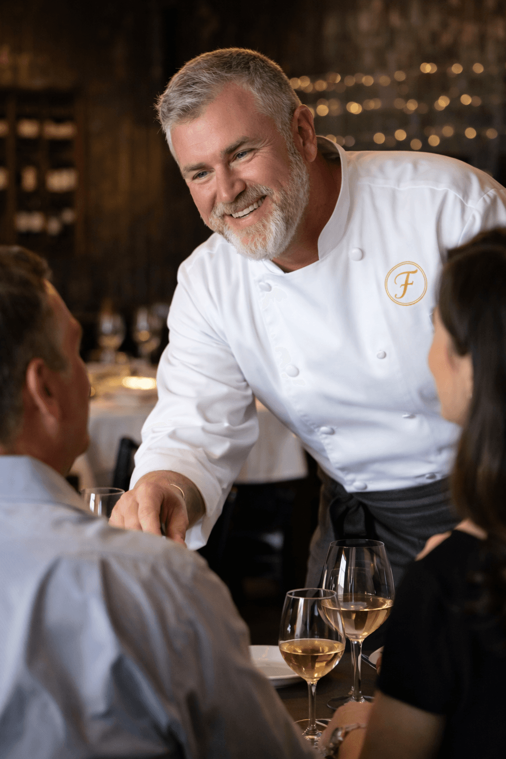 Chef greeting guests at Fozzie's Dining